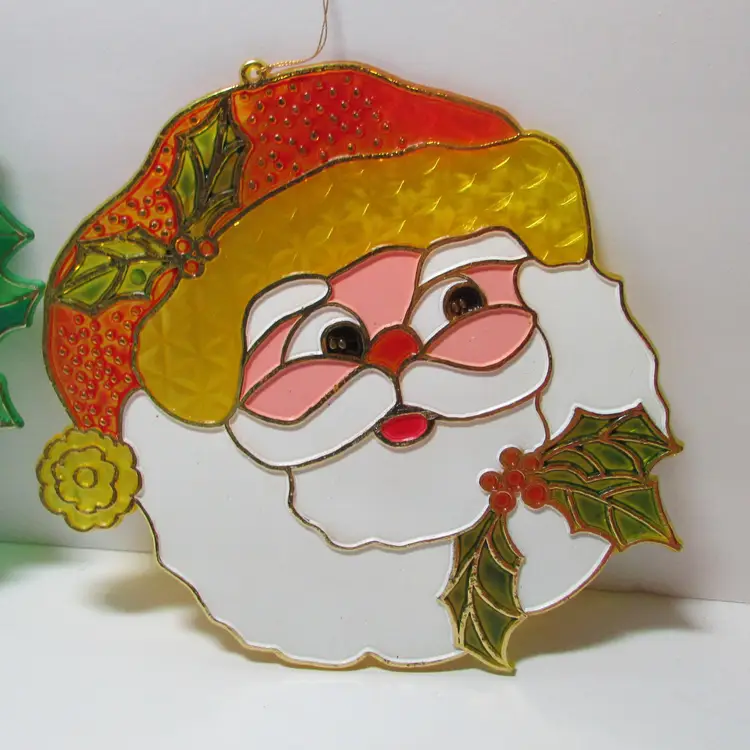 vintage set of 2 plastic stained glass Christmas suncatcher window decor wreath and Santa