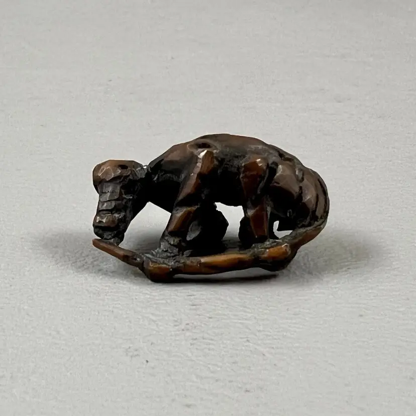 Vintage Miniature Wood Carved Animal 1" Hugging Tail