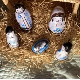 Porcelain nativity scene in a basket