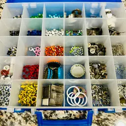Box Of Embellishments Eyelets, Metals, Pop Bottle Tops, Paper Clips, And More