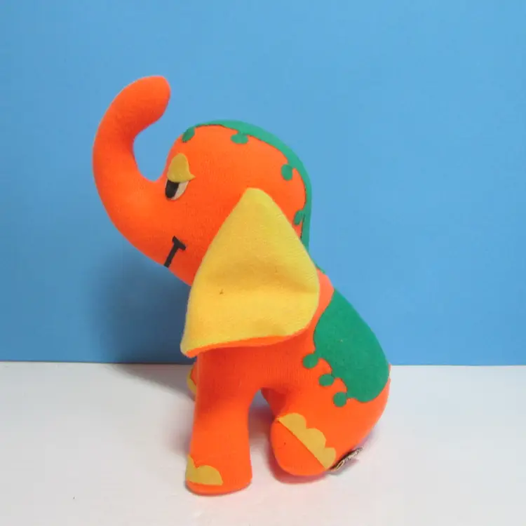 vintage colorful orange elephant sitting stuffed animal trunk up good luck plush Dream Pet