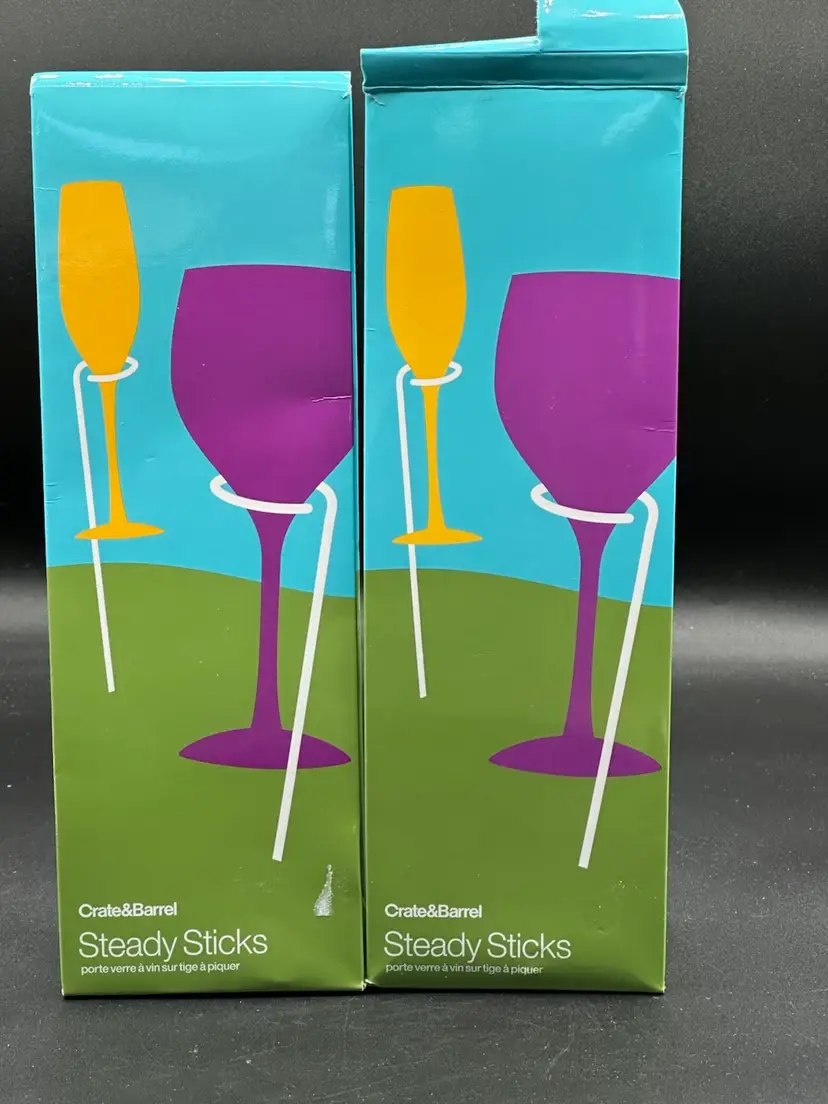 2-Crate & Barrel Steady Sticks wine glass holders.  Set of 2.  New in box.