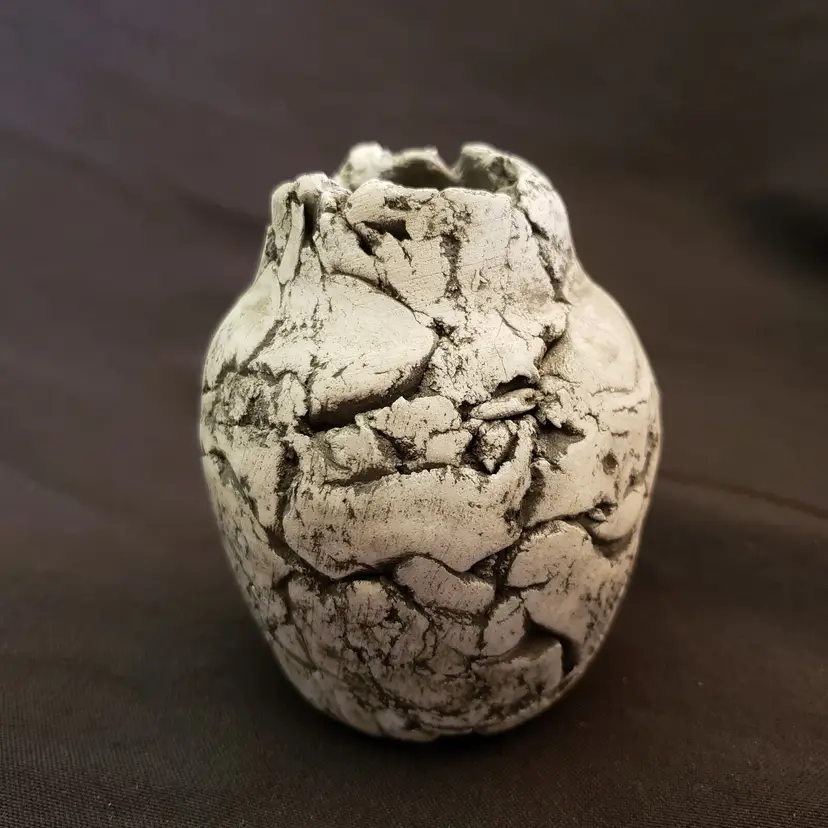 Volcanic Ash Pottery Vase Sculpted Clay unsigned approximately 3 3/8" tall