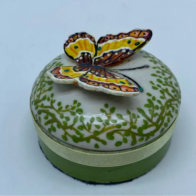 #4128 Hand-painted J.L. Hollander porcelain trinket box with a butterfly and vine motif.