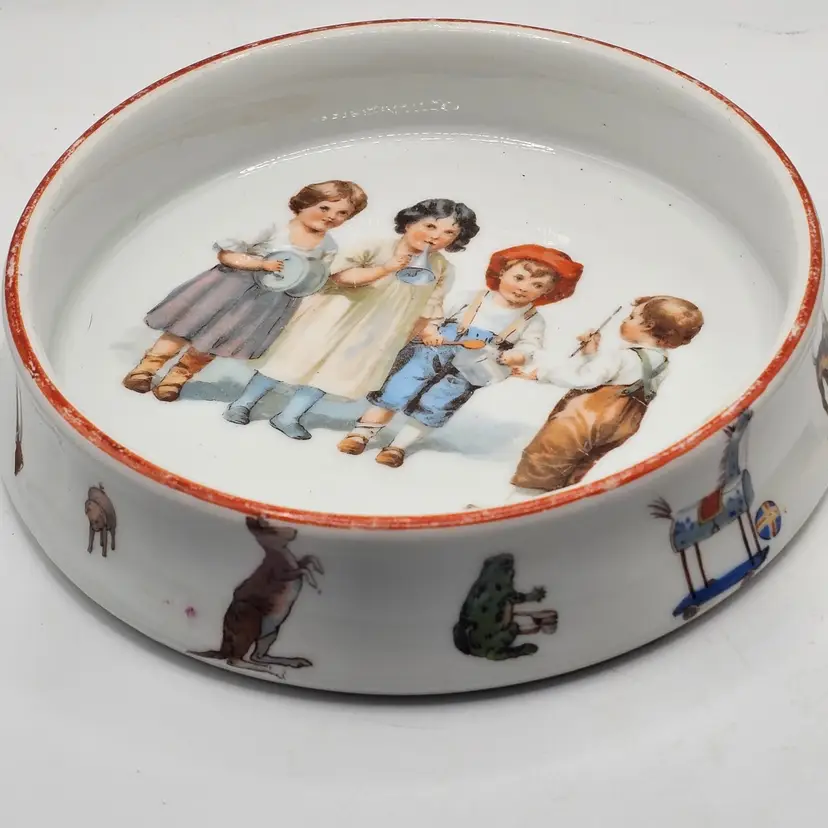 Vintage Child's Porcelain ceramic bowl dish with animals on side 6"