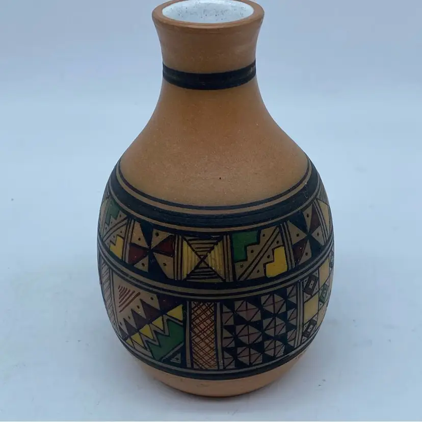 #3038 A Mata Ortiz style Handmade ceramic Pottery vase with geometric Etched And painted designs.