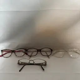 1 Lot of 4 Womans Eyeglass Frames - buyers must replace lenses with their prescription