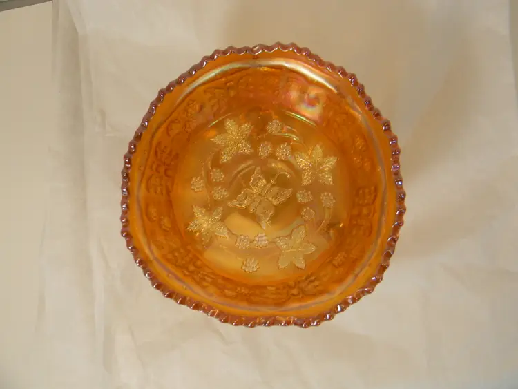 Butterfly and Berry Footed Bowl with marigold Iridescent luster (4 3/4" W X 2 1/5 T)