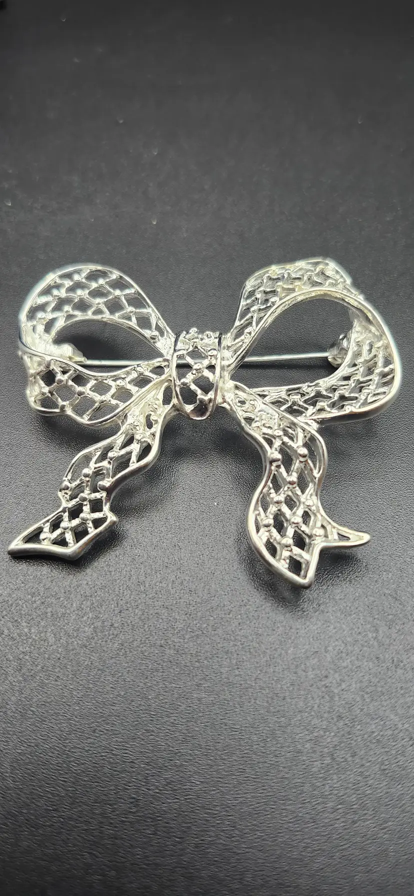 Elegant Silver-Tone Bow Brooch