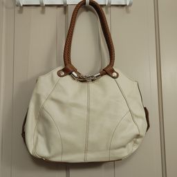Cream bag with brown handles. No brand. As shown. Great condition.