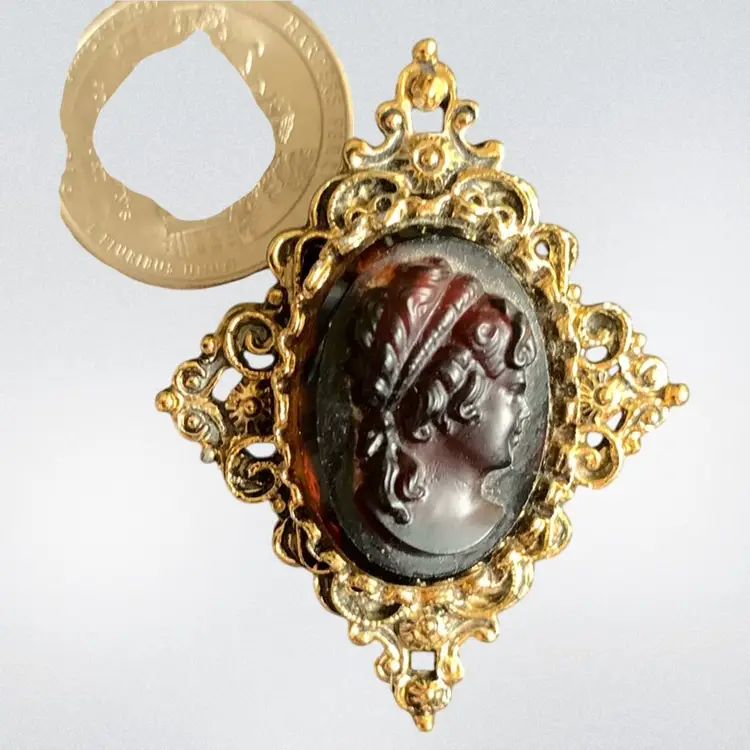 GERRY’S Gold Tone Black  Resin Cameo  On Brown Stripped Glass Set In A Diamond Gold Tone Filigree Brooch