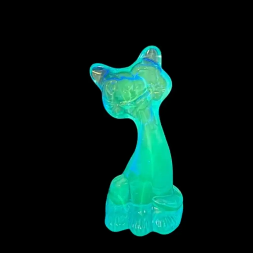 FENTON Blue Mini Happy Cat Figurine 2007 FENTON Art Glass Of America (FAGCA) FENTON Logo•FAGCA Butterfly Logo•Glows 
See Description 
4-1/4” T x 1-3/4” L x 2” W