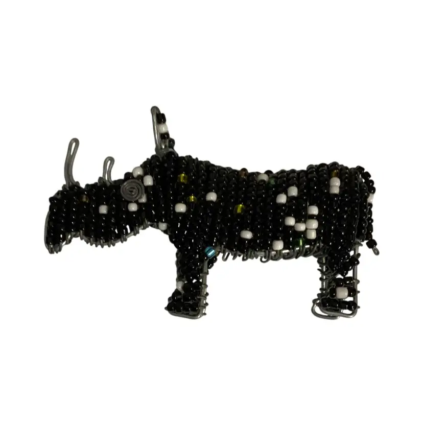 Beaded Rhinoceros Made In Africa. Measures3.75x2.5”