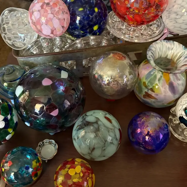 All Sorts Of Glass Orbs 
Different Sizes And Colors