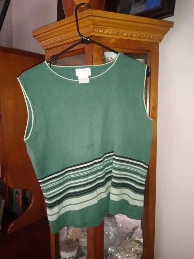green sleeveless shirt