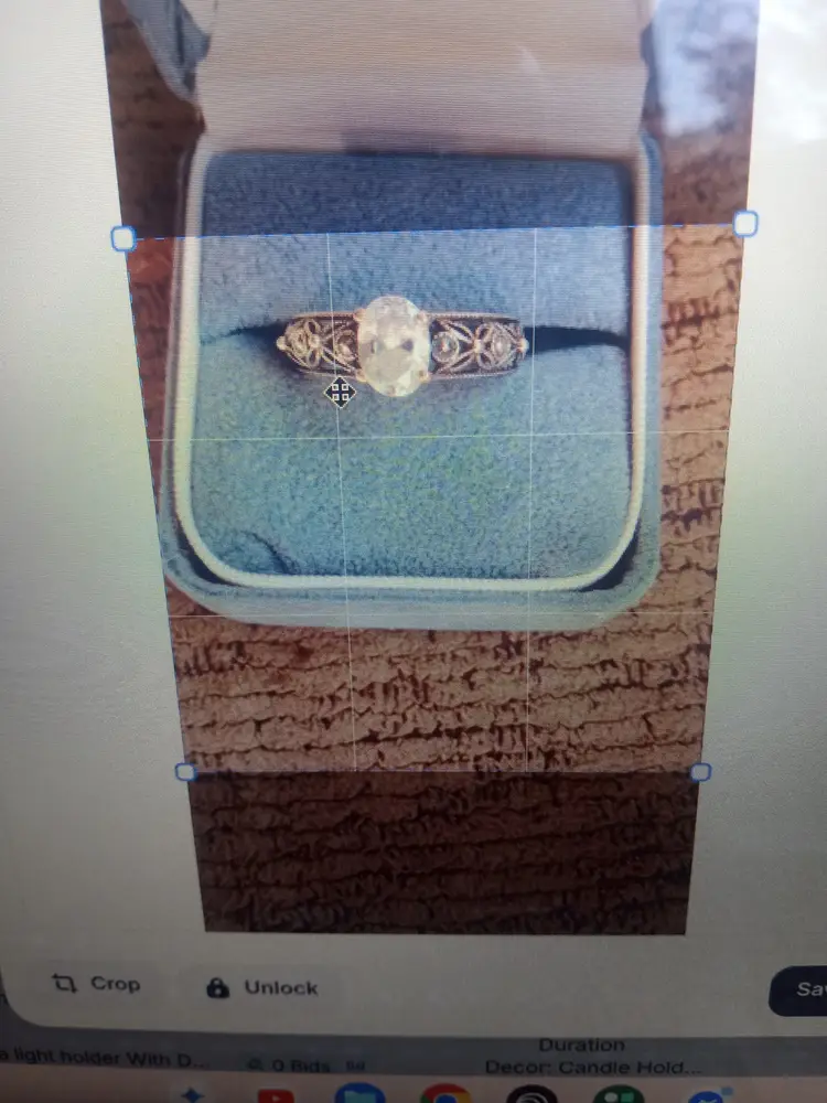 Silver tone ring with faux  stone  pretty designs on band