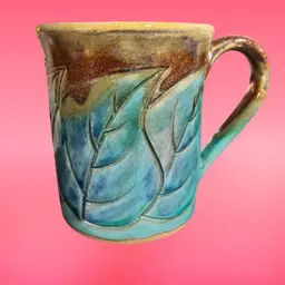 28. Beautiful Studio Pottery Mug With Bronze Glitter On Leaf Design 4”