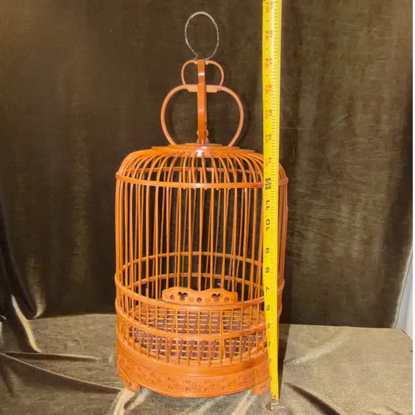 Vintage Traditional Chinese round bamboo birdcage, typically handcrafted from bent bamboo poles and featuring a distinctive vaulted crown structure. Chinoiserie style decor
