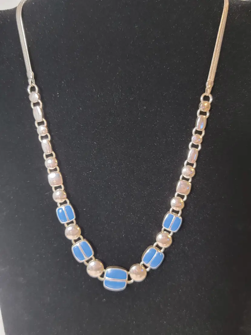 Reverseable silvertone necklace