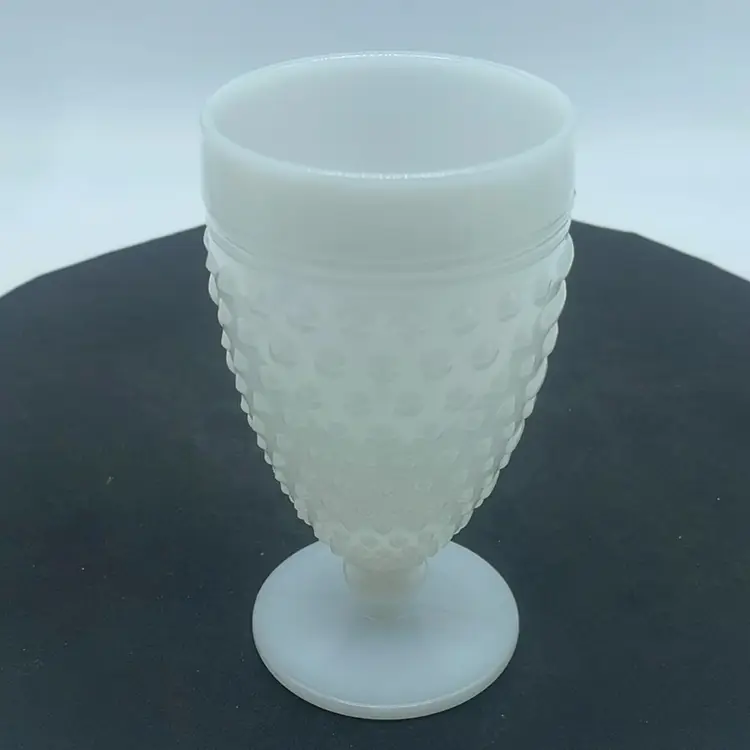 #0820 White milk glass hobnail goblet with ribbed bands.