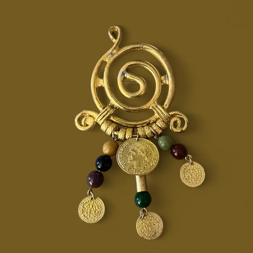 Swirly Gold tone Brooch