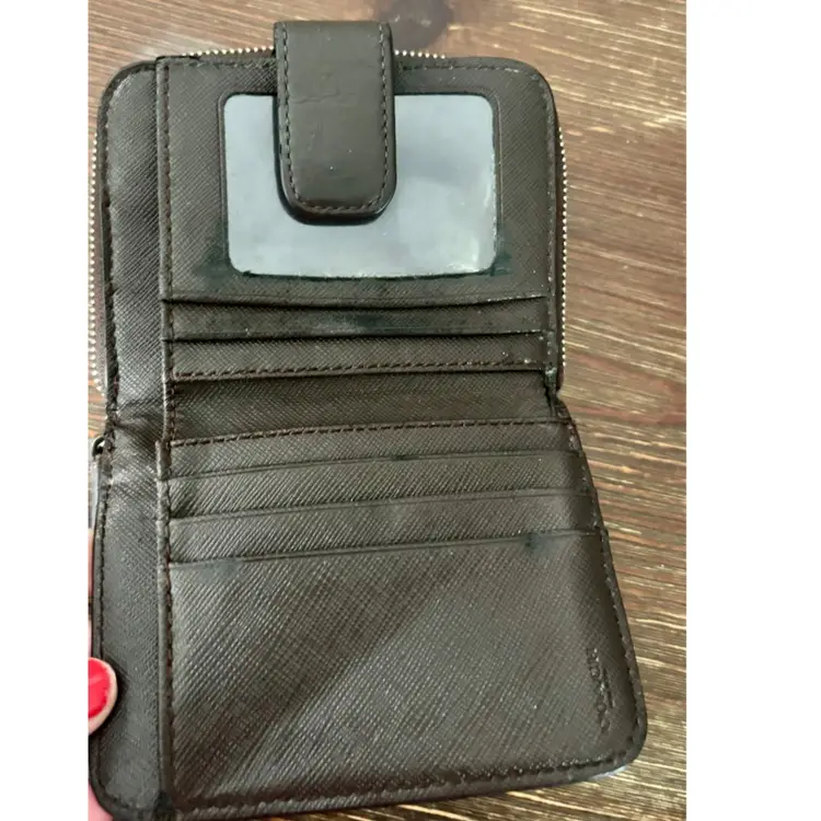 Coach Brown Tan Parker Signature Wallet 
N° H1492 F51774