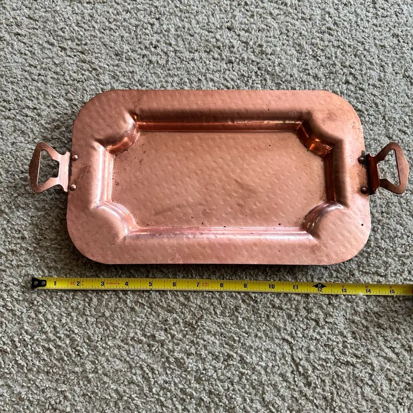 Stunning vintage hammered copper tray with handles.