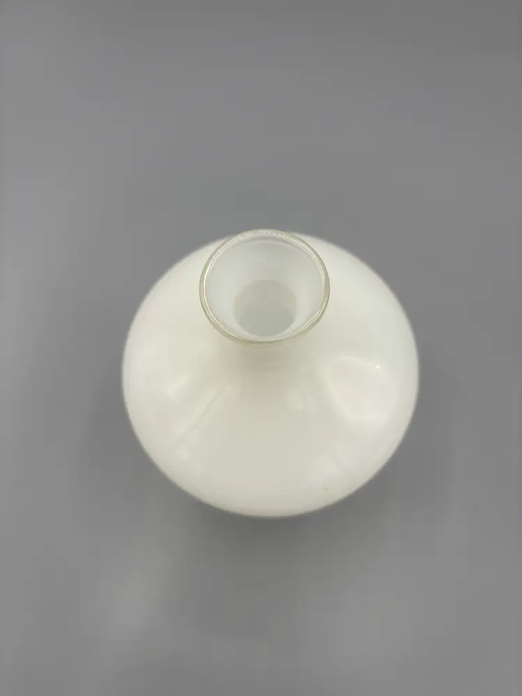White Opalescent glass vase with a twisted stem