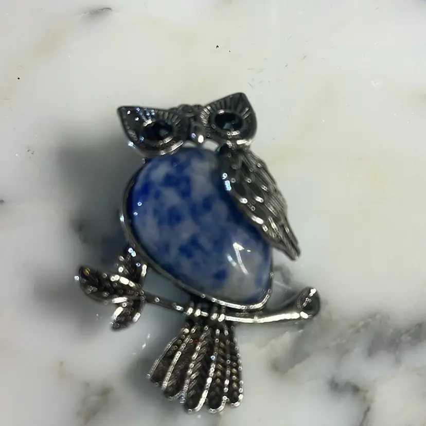 Our Silvertone Pendant With Blue And White Stone