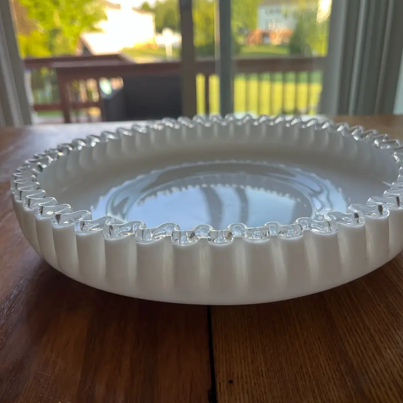 Vintage white milk glass Silver Crest bowl with a ruffled edge.10.25”