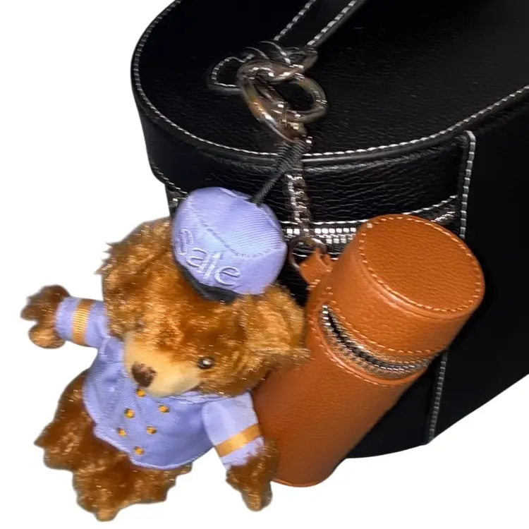 Saie Makeup Bag With Keychains And Skin Product In Box