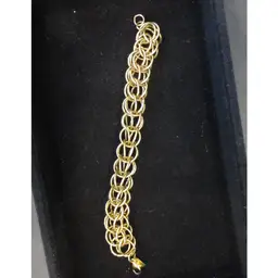 Vintage Monet Gold Tone Metal Interlocking Multiple Chain Link Bracelet Signed - 7.5 Inches, Lobster Clasp