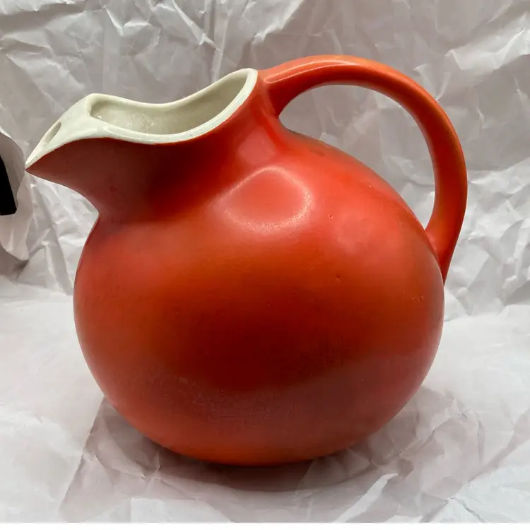 McCoy Orange Pitcher 6.5” Tall. Capacity 64 Ounces