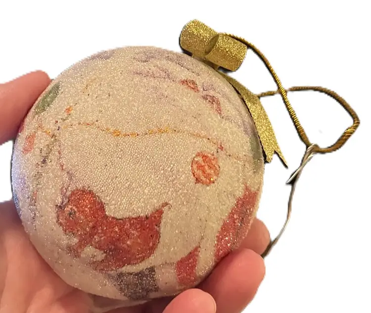 Retro-looking Santa Claus frosted or sugar-beaded ornament