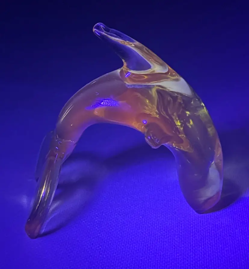 Dolphin Yellow hand blown Art Glass Figurine glows with black light 3.25” tall