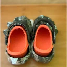 Size Five Kid Knock Off Crocs. Were Nephews. Never Fit Him