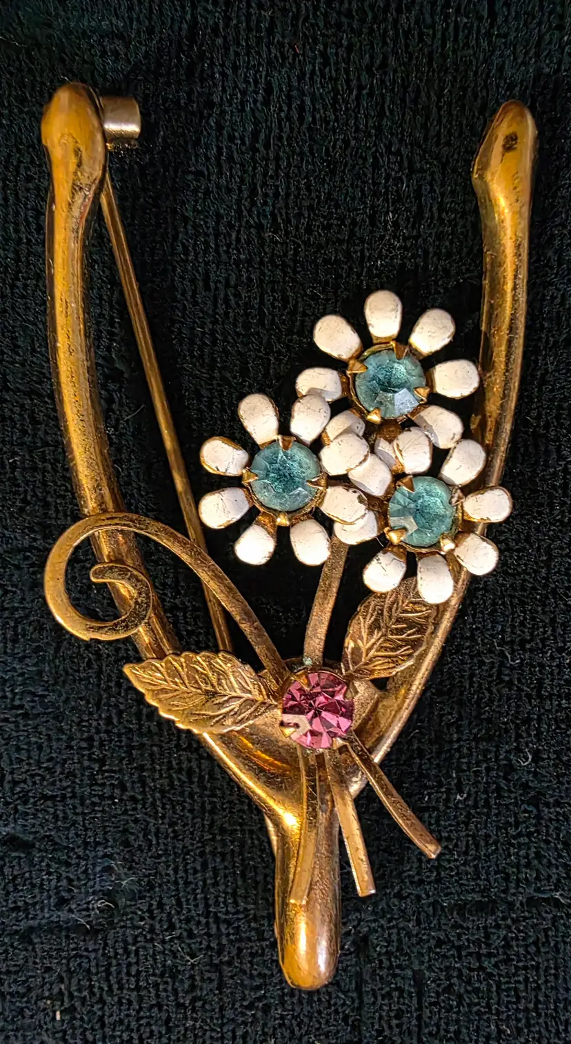 Antique Coro Wishbone Brooch Featuring Rhinestones and Enameled Flowers.