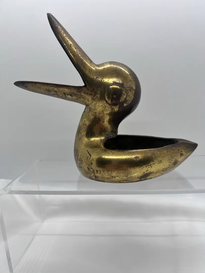 Beautiful Vintage Brass Duck with Wide Open Mouth Ashtray 6 1/4 x 3 1/2"
Not Marked