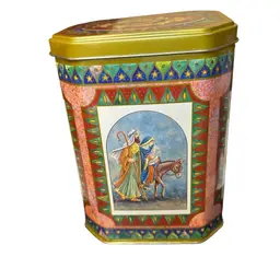 Vintage biscuit tin, likely manufactured in the U.K., featuring Christmas nativity scenes