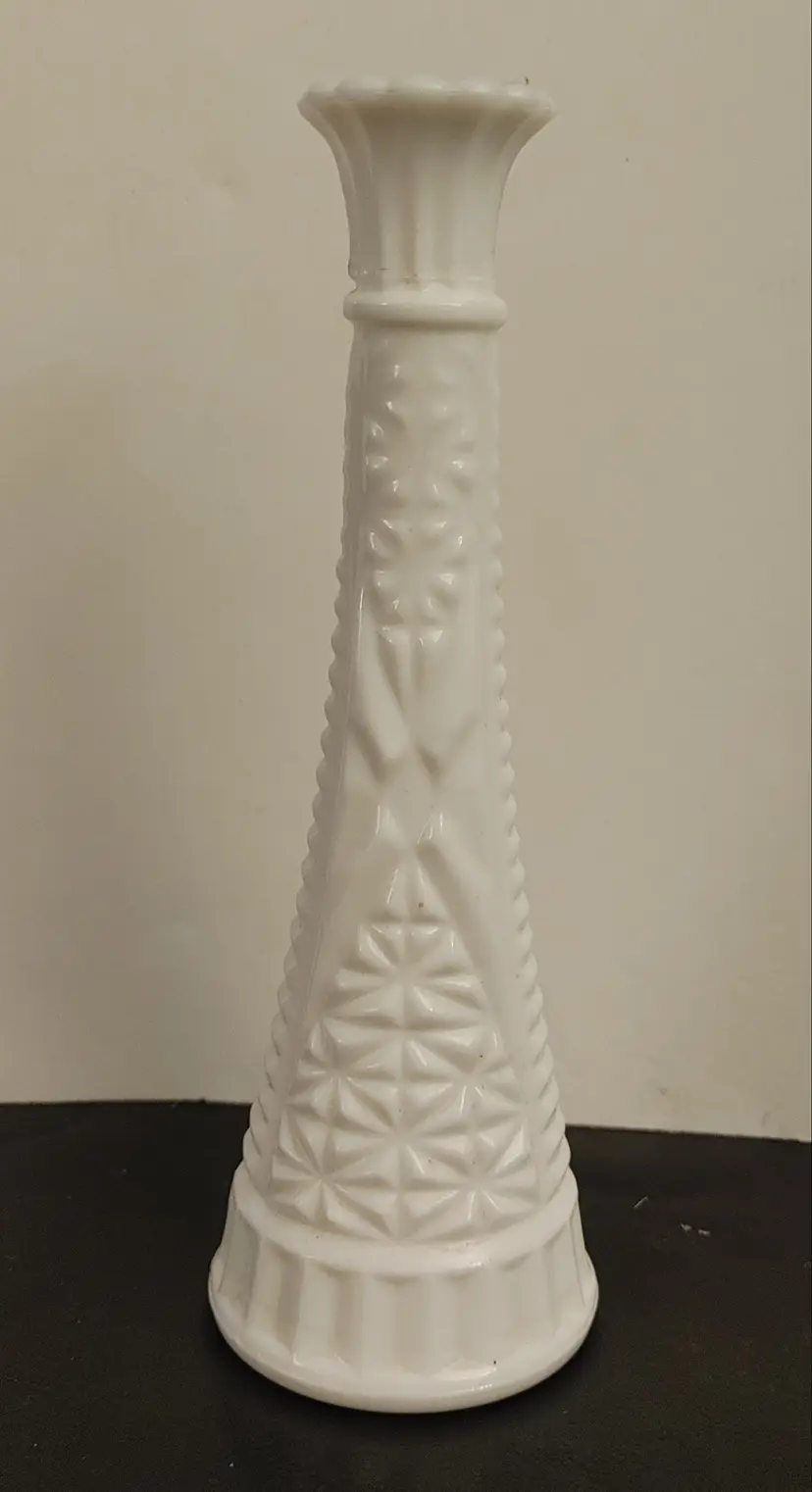 Anchor Hocking Stars and Bars milk glass bud vase. Crack near top. See pics. 9 in high.