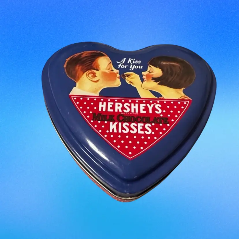A vintage Hershey's Kisses "A Kiss For You" heart-shaped collectible tin