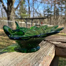 Green Glass, Folded & Swirled Candy Bowl / Trinket Dish With Pedestal. Unmarked. 6.75”l x 5.25”w x 2.75”h.