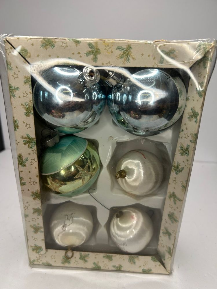Box Of Misc Ornaments 1 Ornament Made In Germany, 3 Satin Mini Precious Moments 1975 And 2 Blue Plastic Balls Box @ 8 1/2x2 1/2x5 1/2