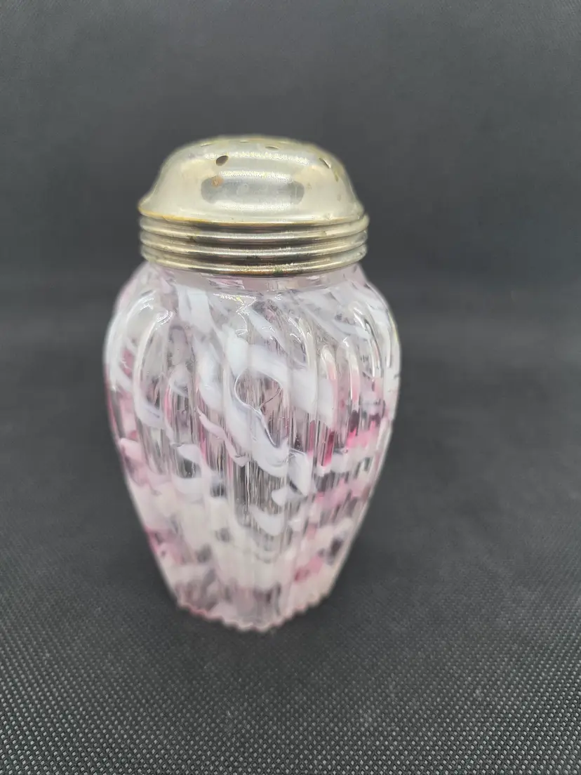 Vintage pink and white splatter sugar shaker. Ribbed glass