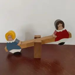 See Saw Girls. Made from Wood. Folk art. 7.5 high by 3 high.