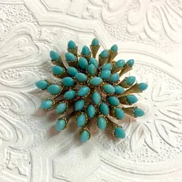 #J64 - Vintage Starburst Brooch Gold Tone & Turquoise Color