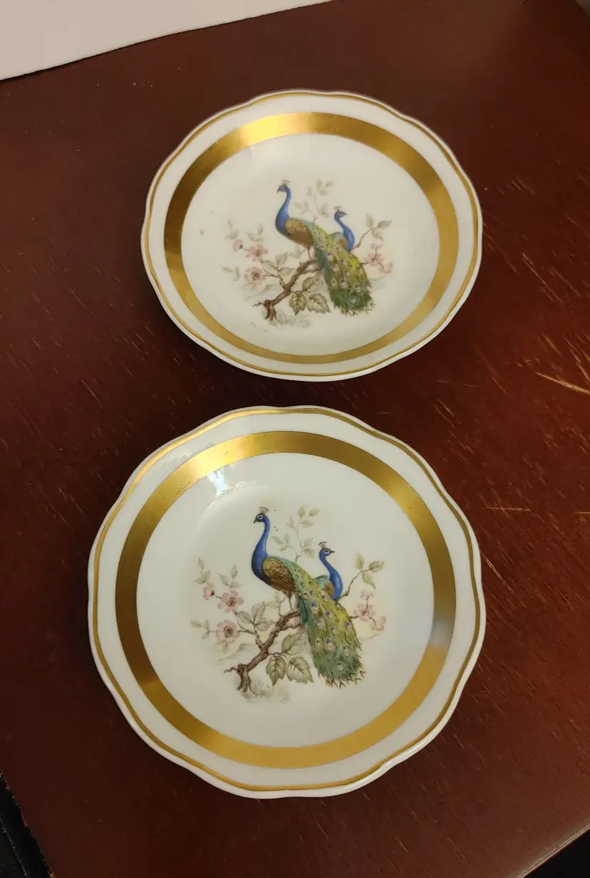 Heatherly bone china Peacock plates/trinket dish. Made in Worcester England. 4 inch diameter. No chips or cracks.