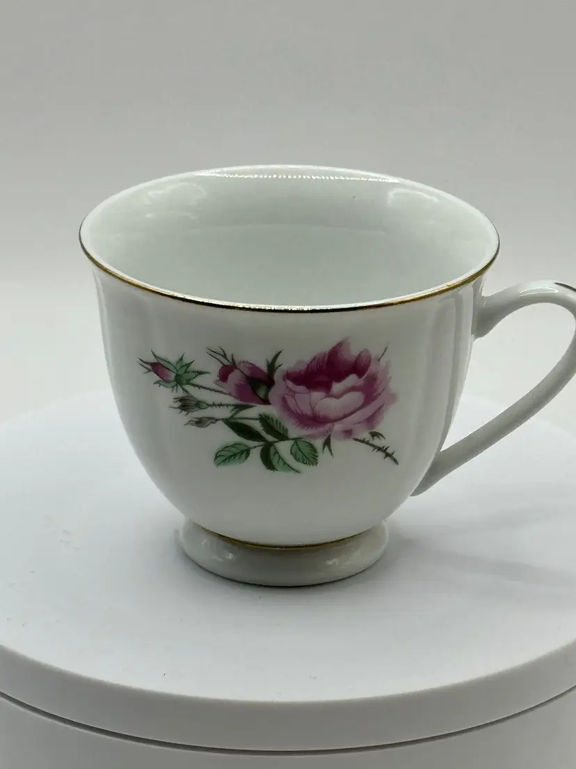 Vintage Elegant Porcelain Teacup with Pink Floral Motif and Gold Trim, Unbranded, Made In Tangshan, China