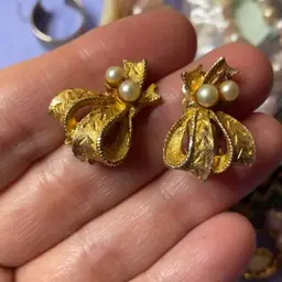 Gold tone and faux pearl clip on earrings