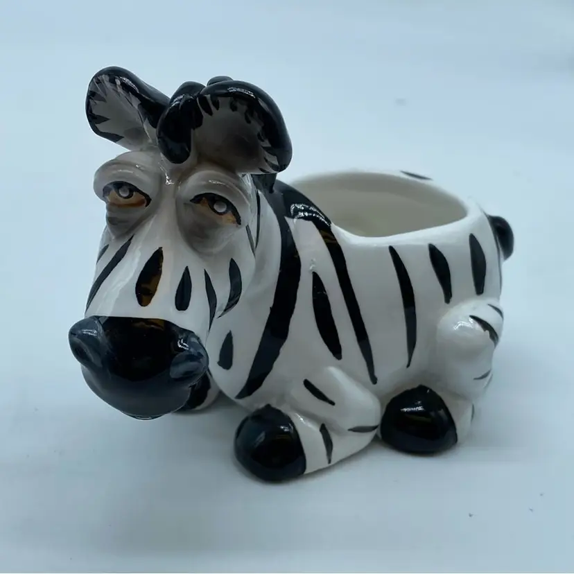 #4910 Whimsical ceramic zebra planter signed 'Douglas'.